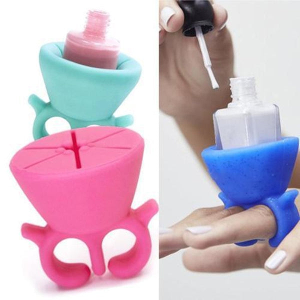 Nail polish bottle finger holder